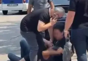 Yolda karşılaştığı eski kocasını darbetti