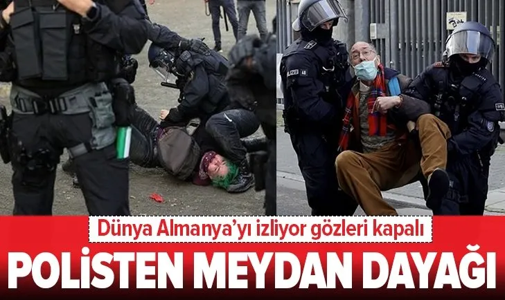 Alman polisi göstericileri darbetti