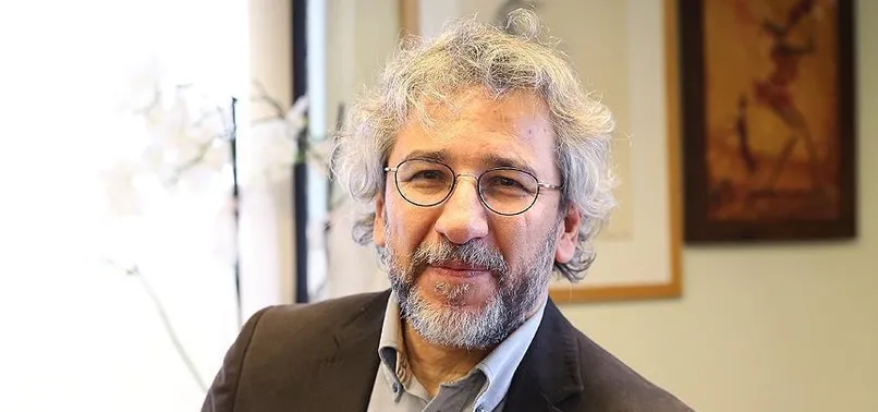 Can Dündar'a 'vatan haini' dedi saldırıya uğradı