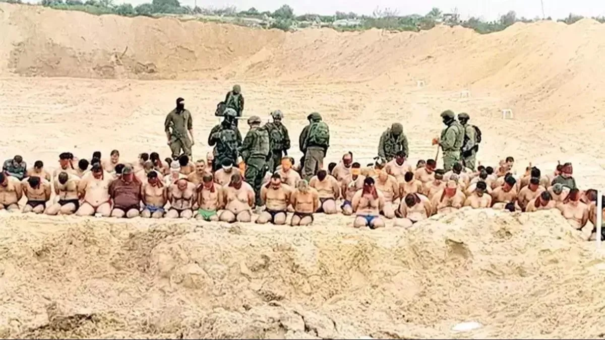 İşgalci İsrail güçlerinden alçak propaganda! Masum Filistinlileri "terörist" ilan edip önce soydular sonra kelepçelediler