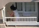 Evin balkonunda köpeğe eziyet