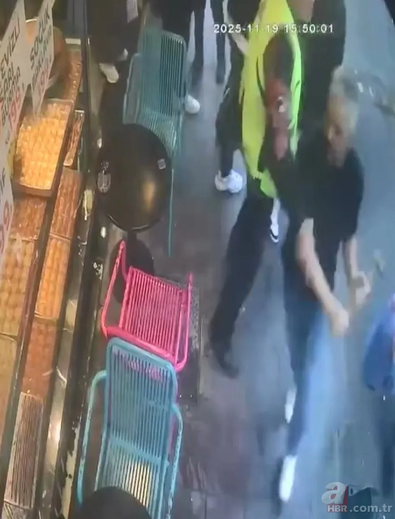 İş yerinin önündeki temizlik esnafı çileden çıkardı! Komşusuna çekiçle saldırdı 1