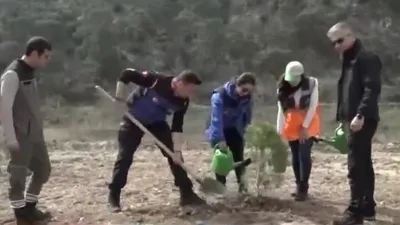 Deprem şehitleri için fidan dikimi