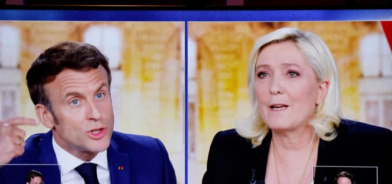 Fransa'da seçim yarışı iyice kızıştı! Macron ve Le Pen canlı yayında kozlarını paylaştı!