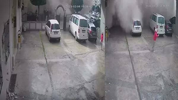 1675884260169.jpg Depreme ilişkin yeni görüntü! Bir anda tuzla buz oldu! Caddeden geçen otomobiller binanın altında kaldı... - 2