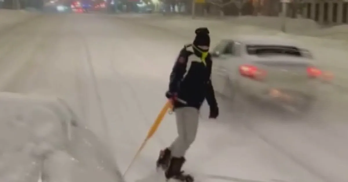 Otomobille snowboard yapan genç polis yakalandı