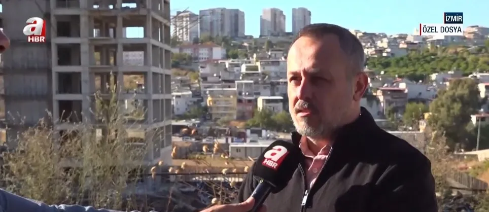1791250847746.jpg İzmir Büyükşehir Belediyesi'nin 6 kooperatif üzerinden yürüttüğü projede, ödemelerini tamamlayan 1.500 aile evlerine kavuşmak için inşaatların tamamlanmasını bekliyor. (Foto: A Haber - Ekran Görüntüsü)