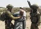 İsrail askeri 64 yaşındaki Filistinliyi darp etti