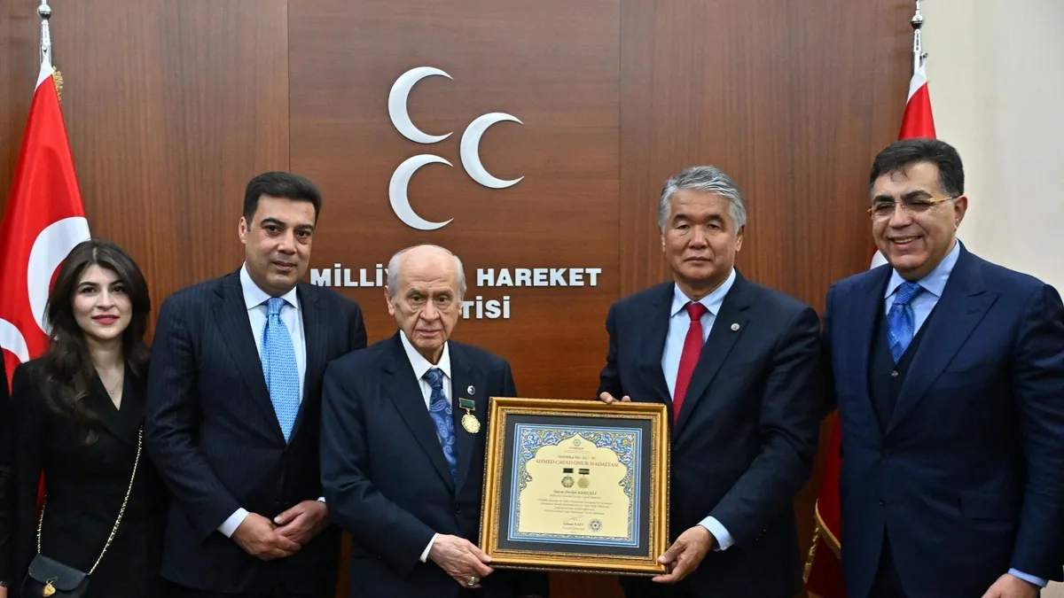 MHP Genel Başkanı Bahçeli'ye "Ahmed Cevad Onur Madalyası" verildi