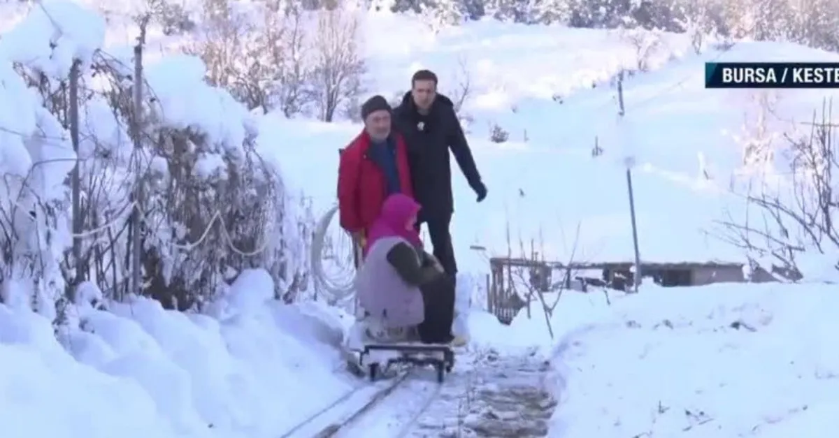 Eşinin yollarına teleferik döşedi