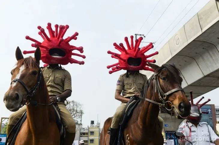 Hindistan’da ilginç uyarı: Corona virüs kılığında sokağa çıktı