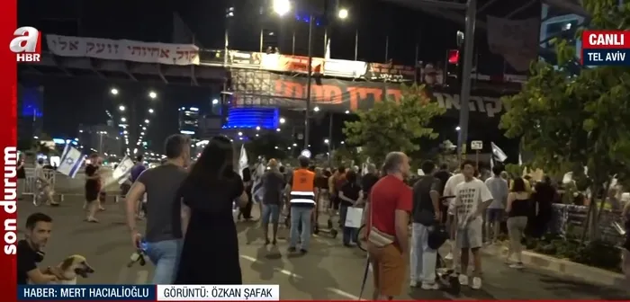 israilde-sokaklar-karisti-binlerce-kisi-toplandi-netanyahuya-tepkiler-dinmiyor-a-haber-ekibi-tel-aviv-sokaklar-1717452722635.jpg İsrail'de sokaklar karıştı! Binlerce kişi toplandı Netanyahu'ya tepkiler dinmiyor: A haber ekibi Tel Aviv sokaklarında - 5