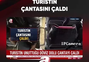 TURİSTİN ÇANTASINI ÇALDI