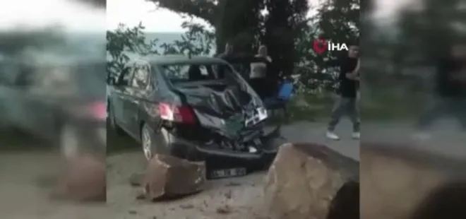 Kopan kaya parçası otomobile düştü