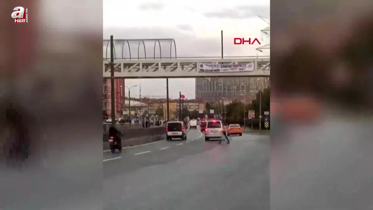 Bir anda yola atladı ve yere oturdu!