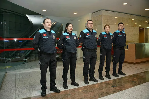 Pasaport polislerine turkuaz yelek - 1