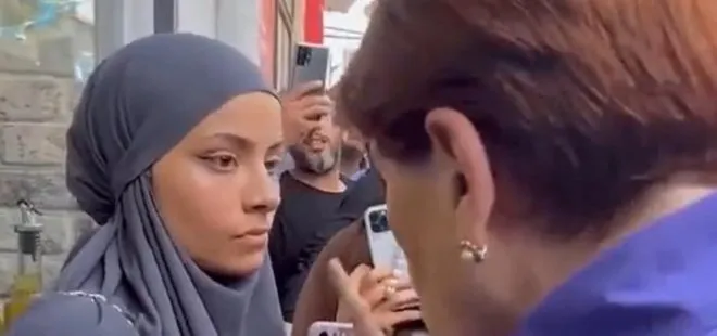 Meral Akşener kendisine soru soran gençlere parmak salladı
