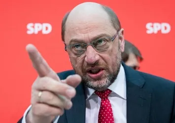 Seçimin galibi Merkel'e soğuk duş
