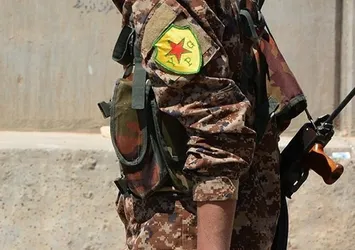 YPG’li teröristlerin üniforma oyunu!