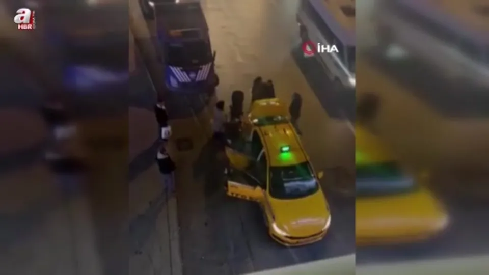 Yolcusuna bıçak çeken taksici kamerada