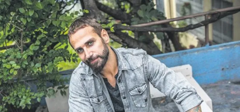 Şarkıcı Doğuş'tan kadına şiddete şarkılı tepki!