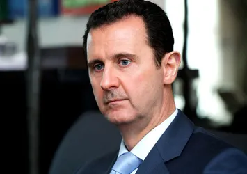 Almanya'da Esad hakkında suç duyurusu