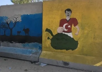 Beton bariyerleri sanat eserine dönüştürdüler