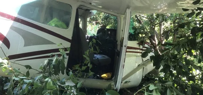 Bursa’da eğitim uçağı mecburi iniş yaparken bahçeye düştü