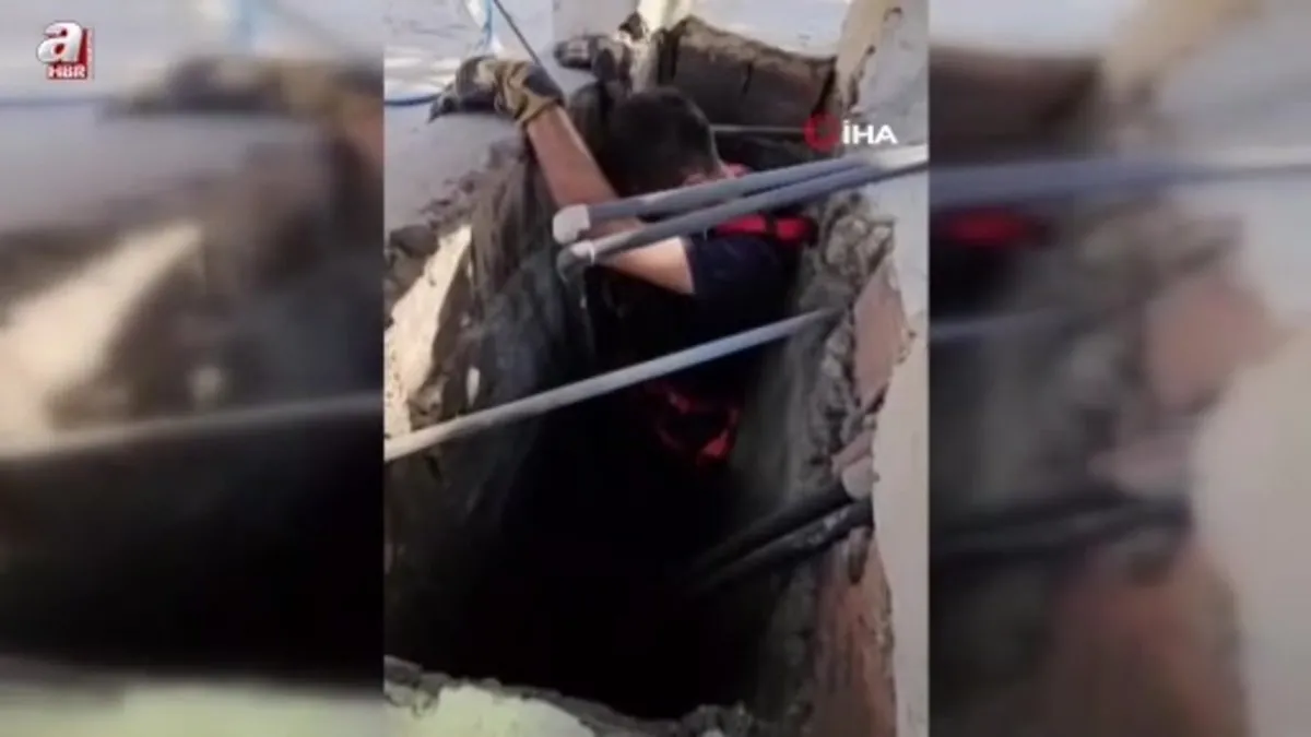 Hatay'da apartman boşluğuna düşen kedi zorlu operasyonla kurtarıldı