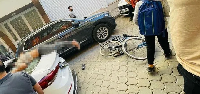 Hızını alamayan bisiklet sürücüsü dehşeti yaşadı: Park halindeki araca saplandı!