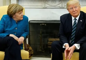 Trump, Merkel'in elini neden sıkmadığını açıkladı