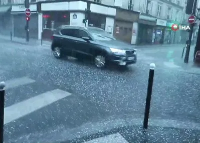 Paris’te 25 derece sıcaklıkta dolu yağdı