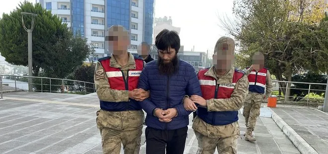 Türkiye’ye girmeye çalışırken sınırda yakalanan DEAŞ’lı terörist Hatay’da adliyeye sevk edildi