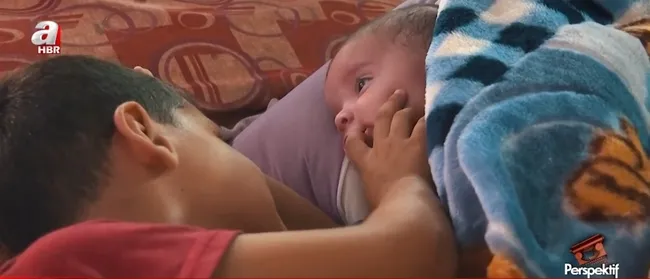 bayramlik-yerine-kefene-sarilan-cocuklar-her-40-dakikada-bir-cocuk-olumu-1749456954505.jpg Ekran görüntüsü / A Haber