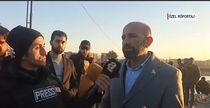 rakkada-terorun-izleri-siliniyor-vali-selame-a-haberde-kenti-yeniden-ayaga-kaldiracagiz-1768945452910.jpg Rakka Valisi Abdurrahman Selame, A Haber’e önemli açıklamalarda bulundu (Ekran görüntüsü)