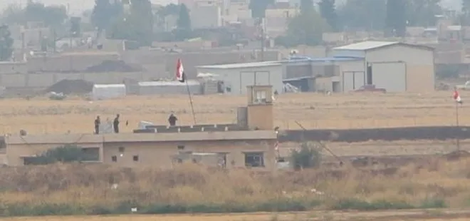 Kamışlı’da binaya terörist paçavrası yerine Suriye bayrağı asıldı