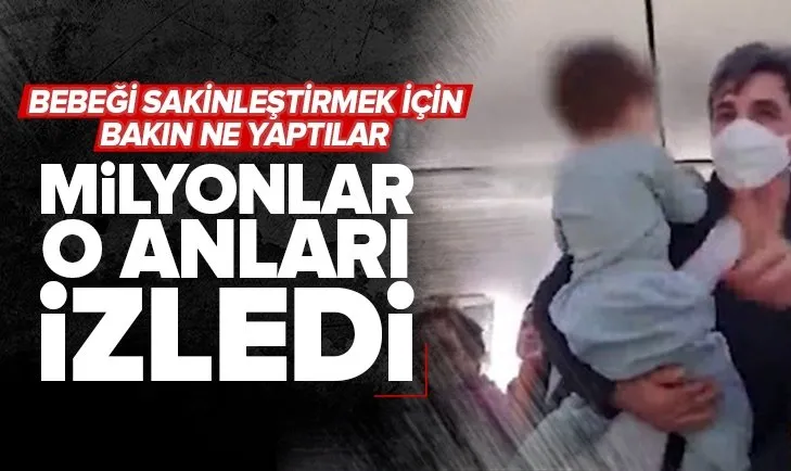 Uçakta şaşkına çeviren anlar! Ağlayan çocuğu sakinleştirmek için bakın ne yaptılar