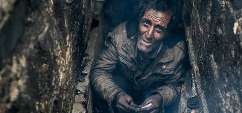 İran'da soğuktan korunmak için boş mezarda uyuyorlar