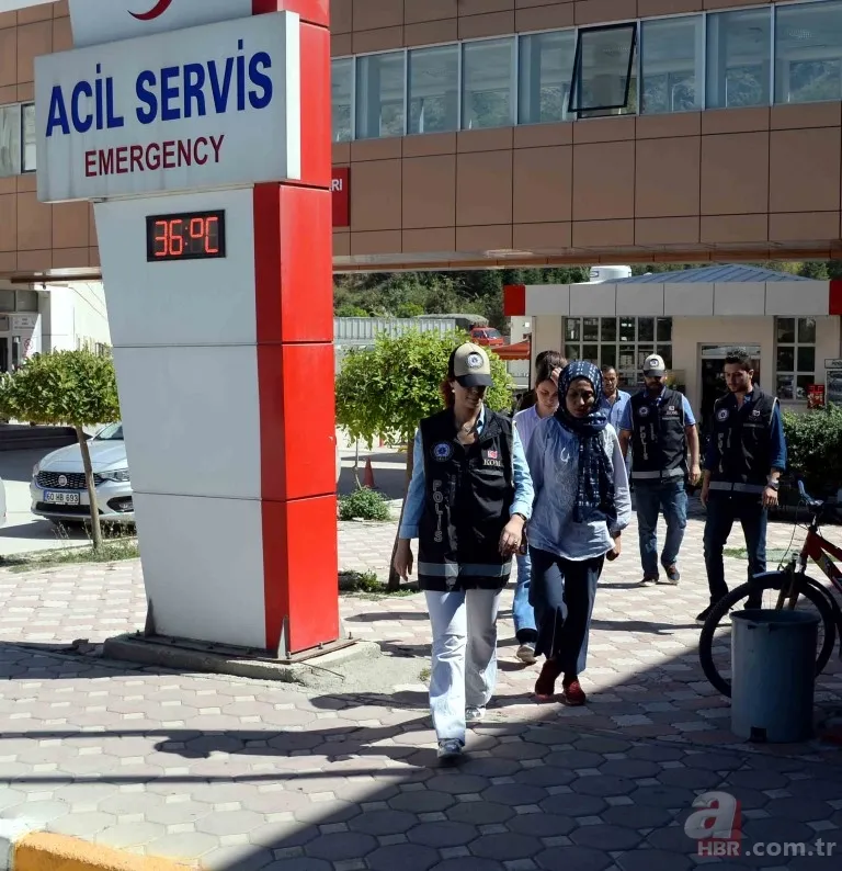 FETÖ operasyonunda yakalanan kadın objektiflere gülerek poz verdi 7
