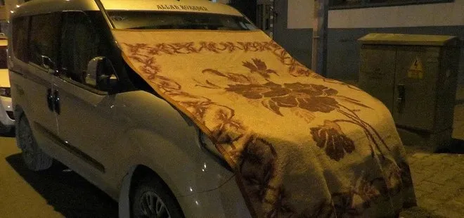 Kars’ta arabalarını korumak isteyenlerden halılı ve battaniyeli önlem
