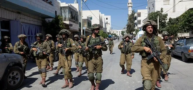 İsrail 12 Filistinliyi gözaltına aldı