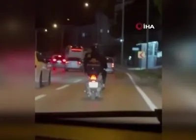 Motosiklete ters bindi!