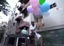 Köpeğini uçan balona bağlayıp...