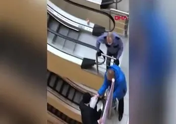 AVM’den giysi çalıp atladı