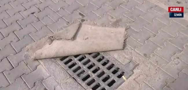 Bornova'da pis koku yayılıyor! Vatandaşlar kokuya karşı mazgalları kilimle kapattı - 5