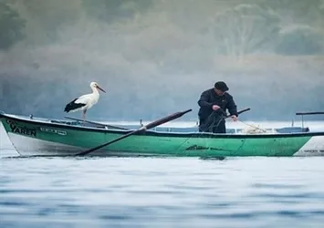 Balıkçı Adem amcanın kadim dostu Yaren leyleğe bayram hediyesi gülümsetti