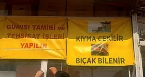 Antalya’daki nalburda hayretler içinde bırakan afiş!
