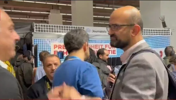 Son dakika: Almanya’da A Haber muhabiri İsmail Erel’e FETÖ’cü alçak Ercan Karakoyun’dan saldırı