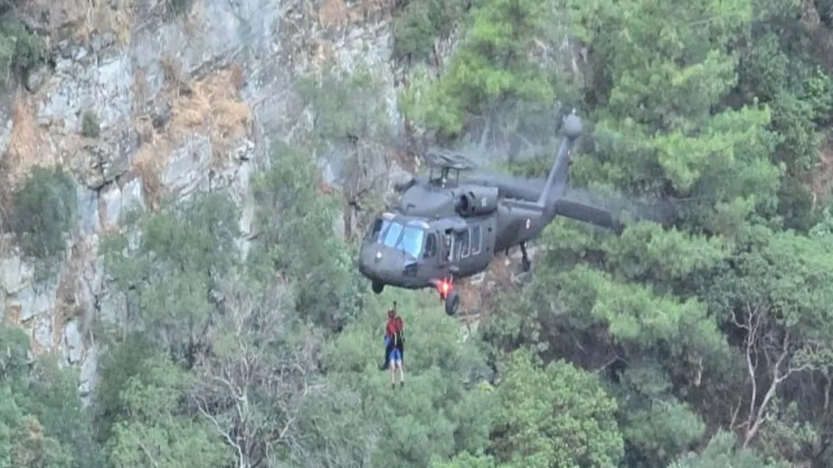 Kaz Dağları'nda mahsur kalan 10 kişi helikopterle kurtarıldı
