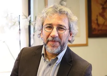 Can Dündar'a 'vatan haini' dedi saldırıya uğradı